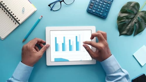 Man's Hand Working Digital Tablet Office Desk Using Self Created Chart