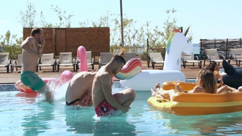 Guy Splashed Females While Sunbathing When Jumped In Pool