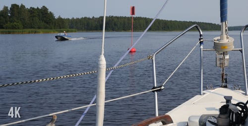 Sailing on a Calm Lake in Daytime