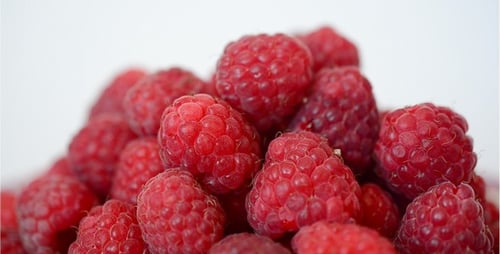 Close Up of Pile of Red Raspberries
