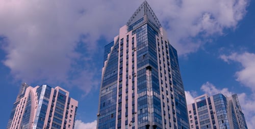 City Buildings And Clouds