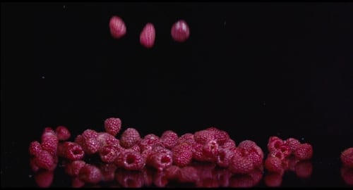 Fresh Raspberries Isolated On Black Background