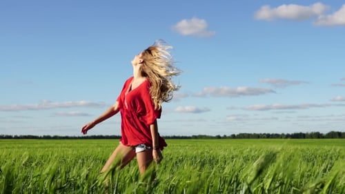 Happy Woman Enjoying Nature Beautiful Blonde Dancing On Field