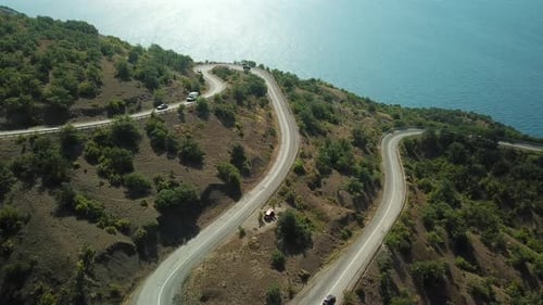 A Winding Road Through the Crimean Mountains Along the Sea