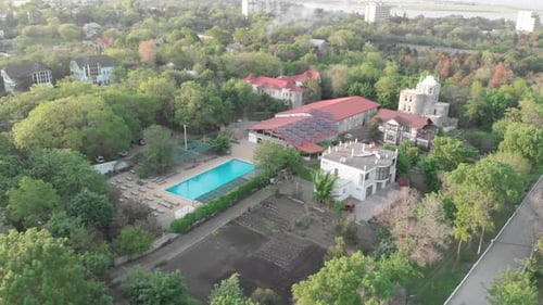 Hotel complex with swimming pool, aerial view.