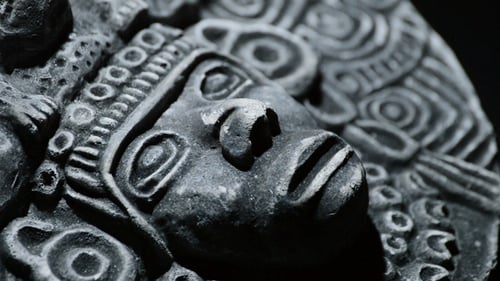 Close Up of Detailed Stone Carving of a Face