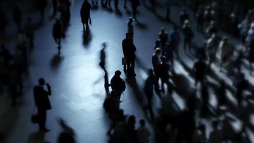Pedestrians Commuting on Crowded City Urban Street