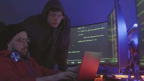 Software Developers Discussing Program Code