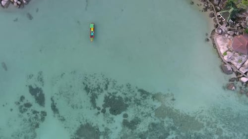 Top View on the Beach with Colors Boats