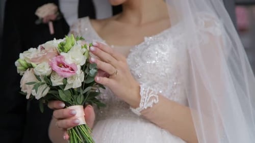 Elegant Wedding Bouquet Held by Bride