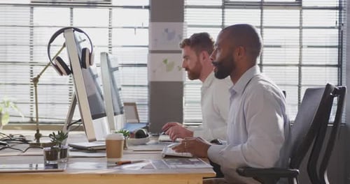 Young creative professionals working in a modern office