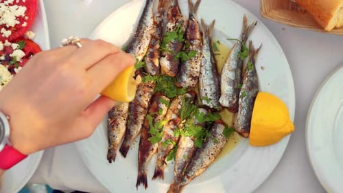 Grilled Sardines with Lemon in a Tropical Setting