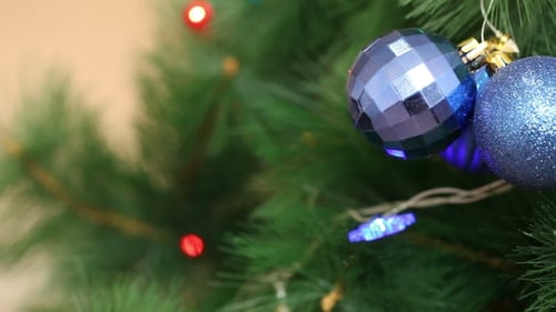 Decorated Christmas Tree with Blue Spherical Ornaments