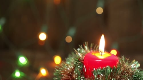 Festive Christmas Candle Glowing Brightly