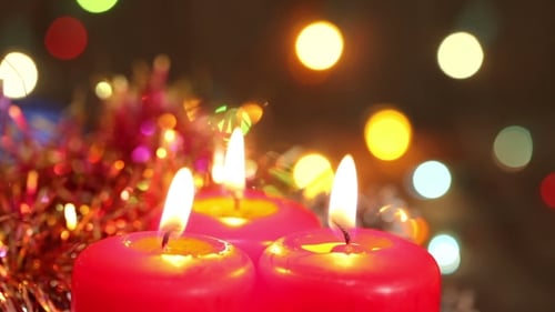 Three Burning Christmas Candles