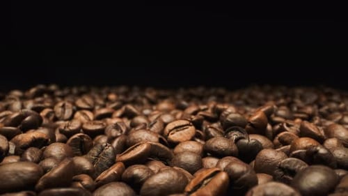 Beautiful View Of Falling Coffee Beans