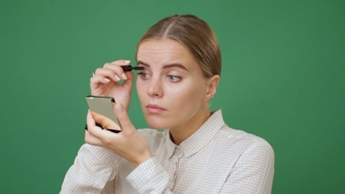 Woman Doing Eye Make Up