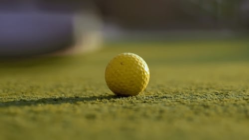 Playing Mini Golf in the Summer