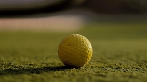 Playing Mini Golf in the Summer