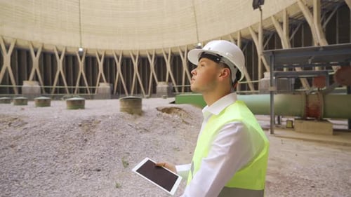 Working engineer.At the power plant.