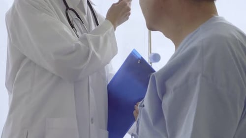 Doctor Take Care of Patient at Hospital or Medical Clinic