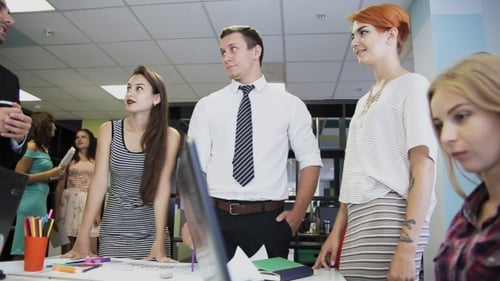 Business, Startup And People Concept - Happy Creative Team Discussing Project In Office