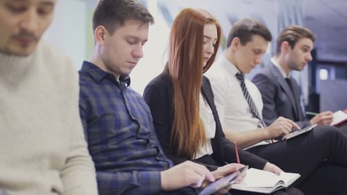 Young Adults Working in an Office Waiting Room