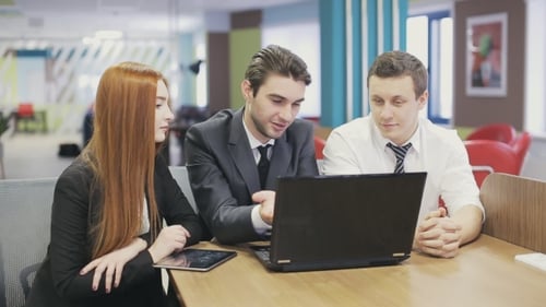 Serious Brainstorming Of Business People In Office