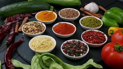 Various Vegetables and Spices Rotating in a Close Up