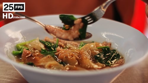 Close up of noodles being eaten