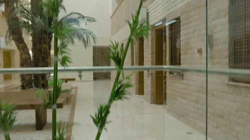 An Elevator Is Going Up In Building Interior