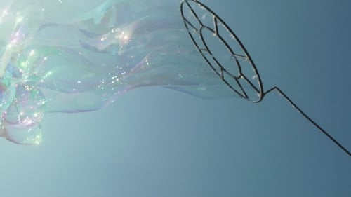 Giant Bubbles Flowing in the Air on Sunny Day
