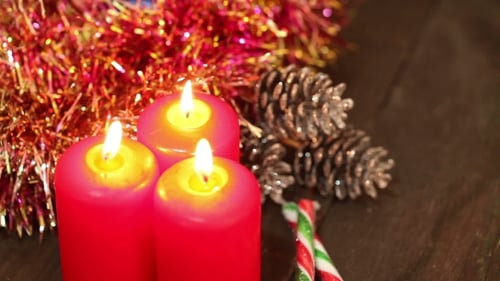 Christmas Candles and Holiday Decorations Close Up
