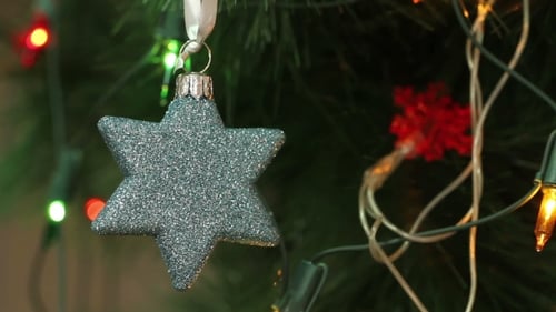 Sparkly Star Ornament on Christmas Tree, Close Up