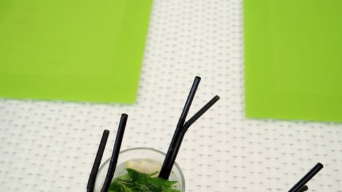 Four Refreshing Mint Lemon Drinks on Table