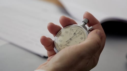 Close Up of Hand Timing with Stopwatch