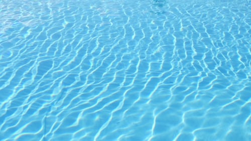 Water Motion. Blue Water In Swimming Pool