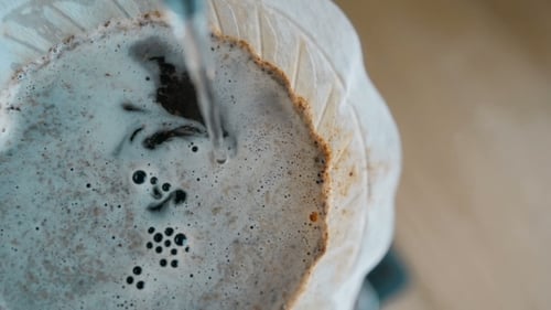 Barista Pouring Water On Coffee Ground With Filter, Hand Drip Coffee