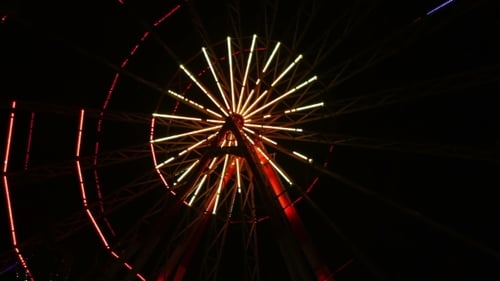 Illuminated Ferris Wheel at Night