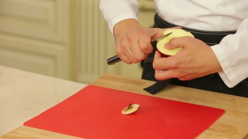 Chef Cuts Apple for Delicious Recipe Preparation
