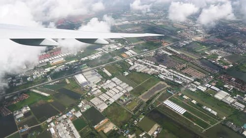 The Airplane During Landing, City and Fields Area Top View