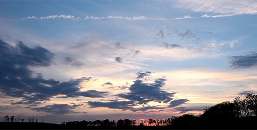 Colorful Sky at Sunset Over a Rural Landscape