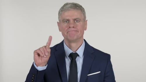 Man Points Finger in a Warning Gesture
