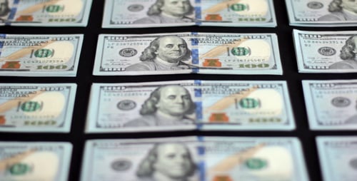 A Hundred Dollar Bill On Black Background 2