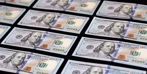 A Hundred Dollar Bill On Black Background 7