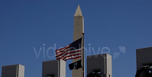 American Flags, Monuments, Wreaths against a Blue Sky