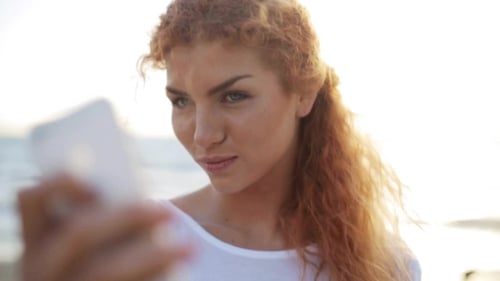 Happy Woman Taking Selfie With Smartphone On Beach 38