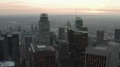 Passing Skyscrapers in Downtown Los Angeles, California at Beautiful Sunset,