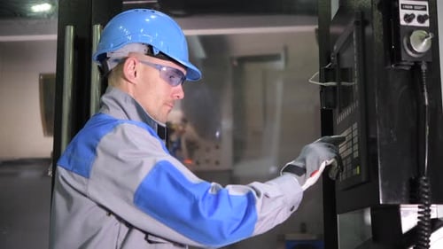 Caucasian CNC Machine Operator