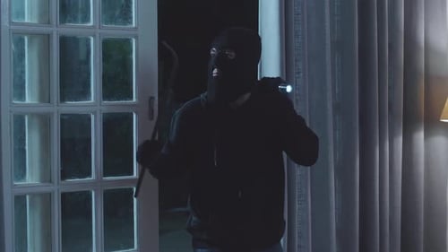 Figure with Crowbar Enters House at Night